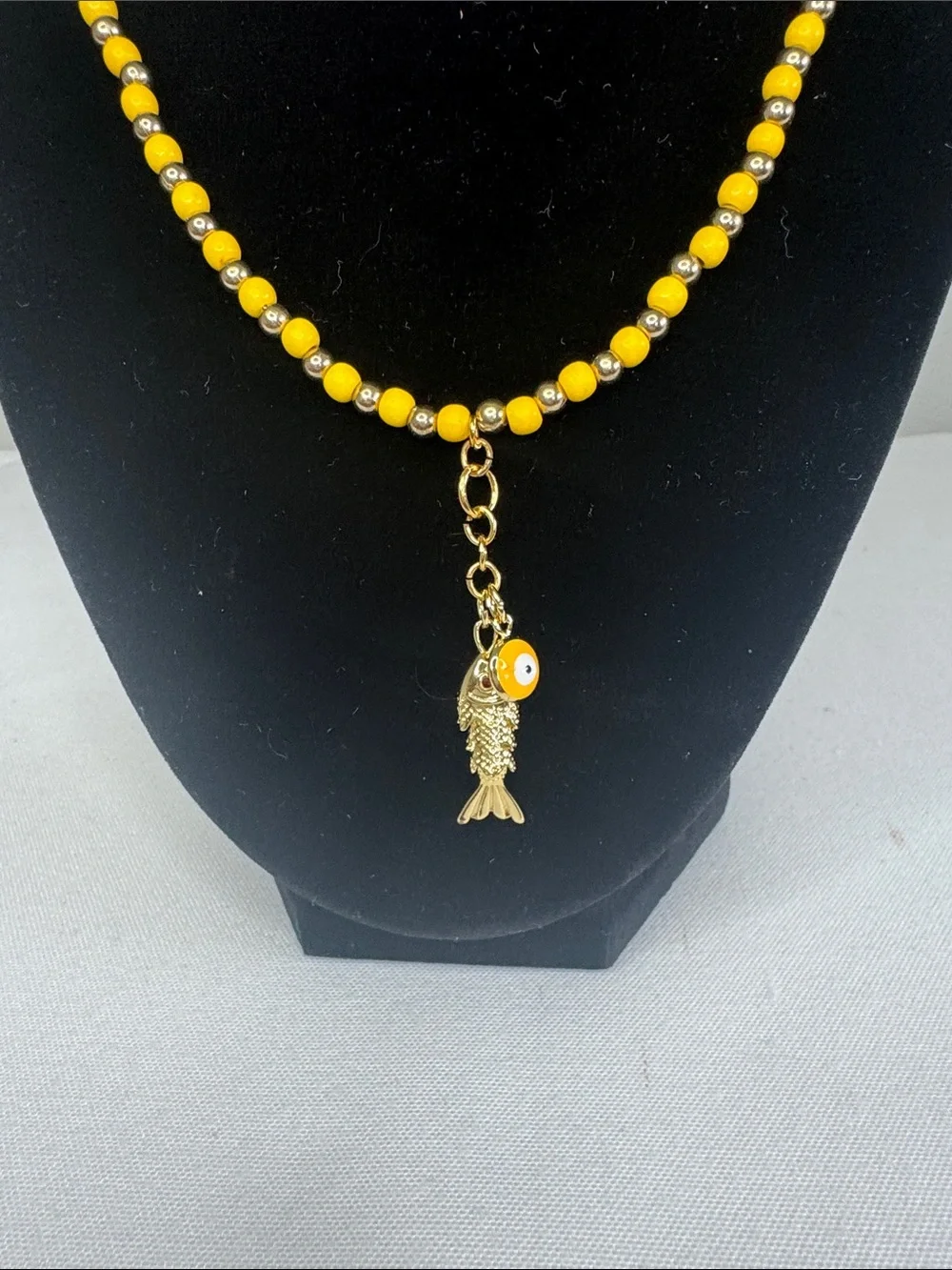 Yellow/Goldtone Beaded Fish & Evil Eye Charms Necklace - Unbranded 18”.